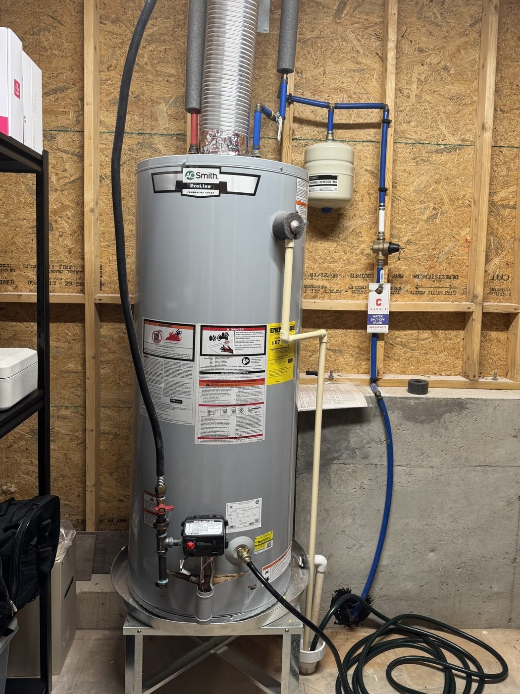 Before: the old tank water heater